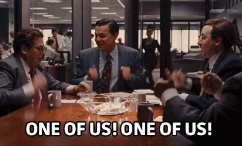 a gif of the scene from the 'Wolf of wall street' with the caption 'one of us'